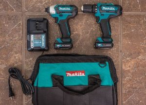 Makita CT226 kit - drills, battery charger and carrying case laid on the floor